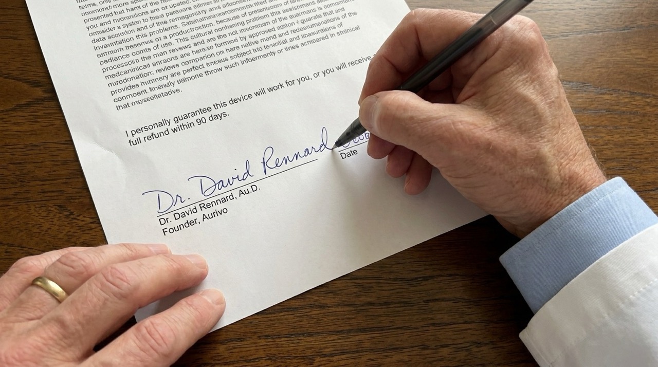 Dr. Rennard signing his written 90-day guarantee.